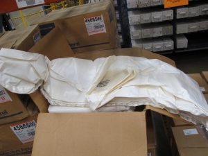 LOT TO INCLUDE: (132) COVERALLS, EXTRA EXTRA LARGE SIZE, HAZARDOUS/CHEMICAL PROTECTION KIND, SARANEX-LAMINATED POLYPROPYLENE W/TAPED SEAMS MATERIAL, WHITE COLOR, (10) BAGS, 12" X 16" X 2 MIL THICK SIZE, SAMPLE KIND, CLEAR PLASTIC MATERIAL. LOADING & HANDLING FEE $15-4218